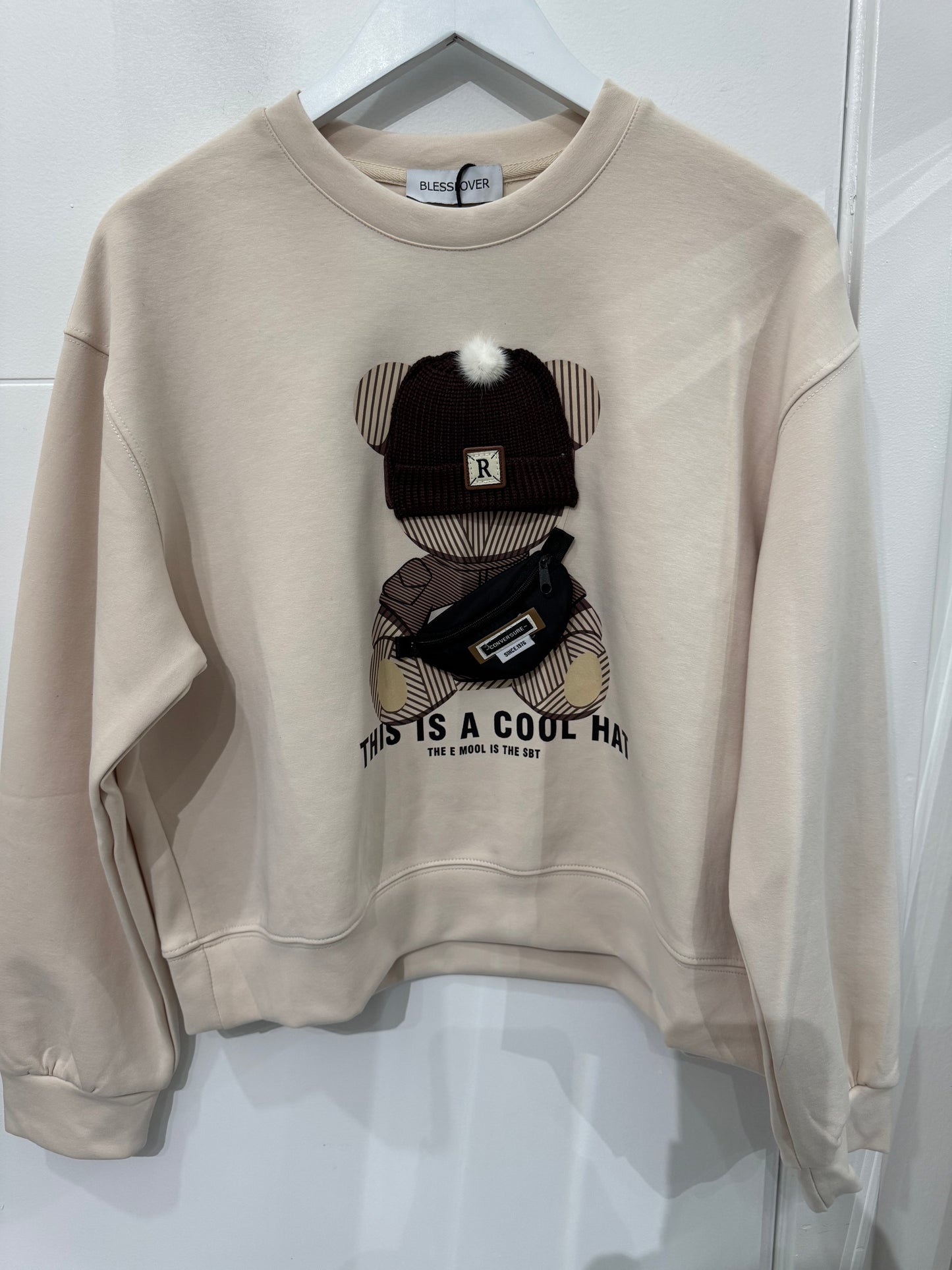 Cream sweater